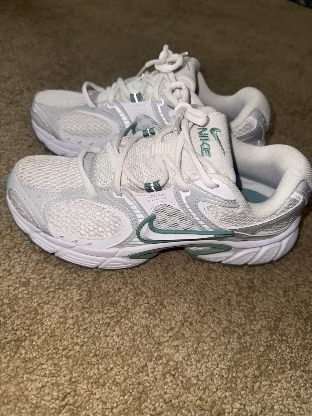 Nike White Sneakers with Teal Accents